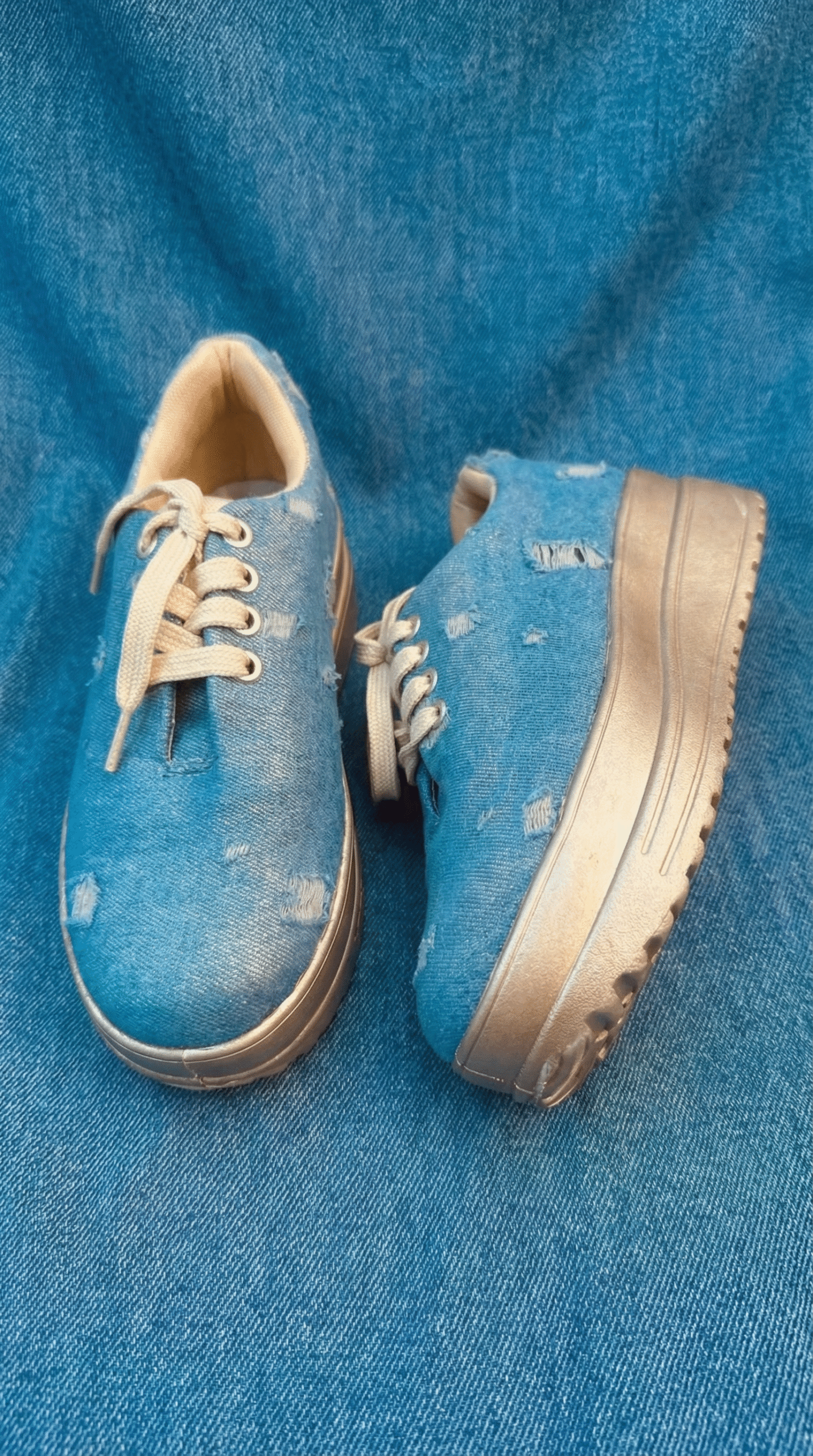 Firefly_Gemini Flash_Create an image for my website of the sneakers in the reference image with denim back 238404