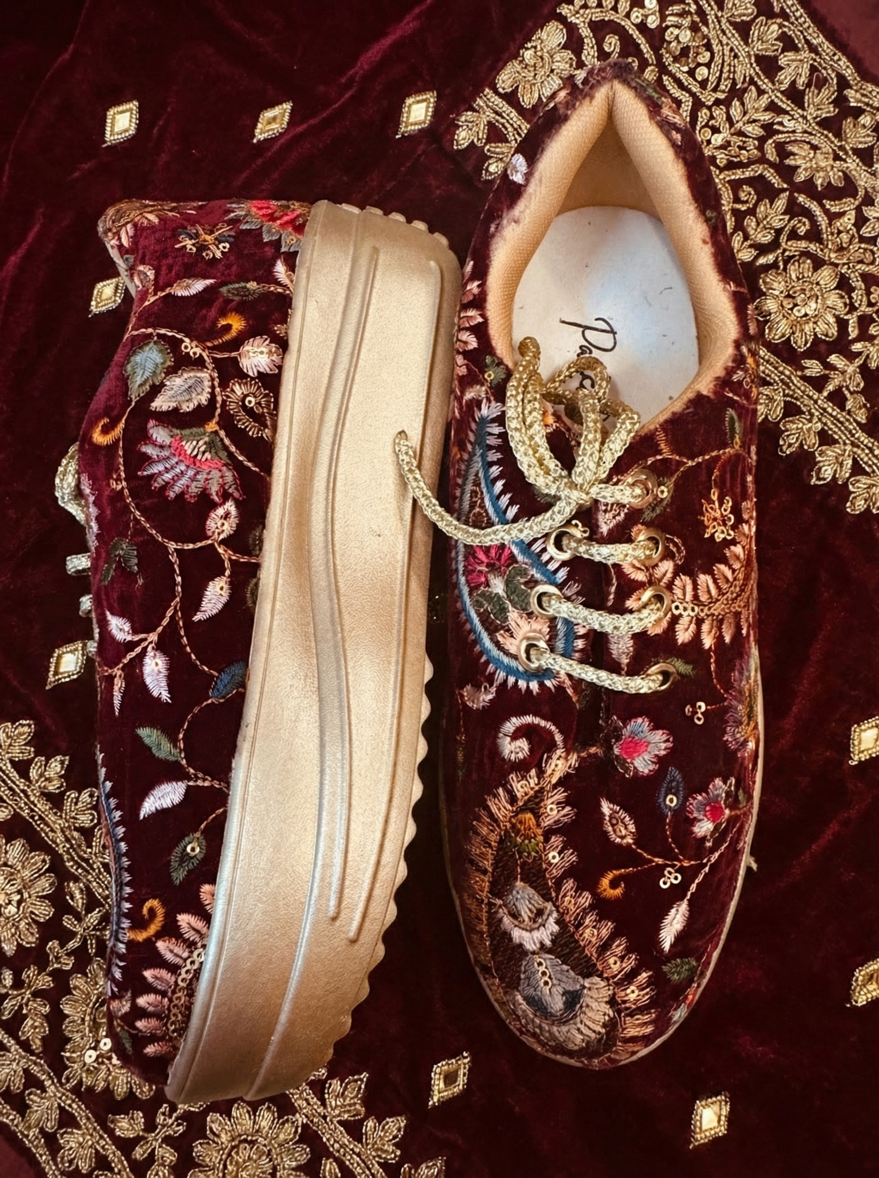 Firefly_Gemini Flash_Create an image for my website of the sneakers in the reference image with maharoon c 156219