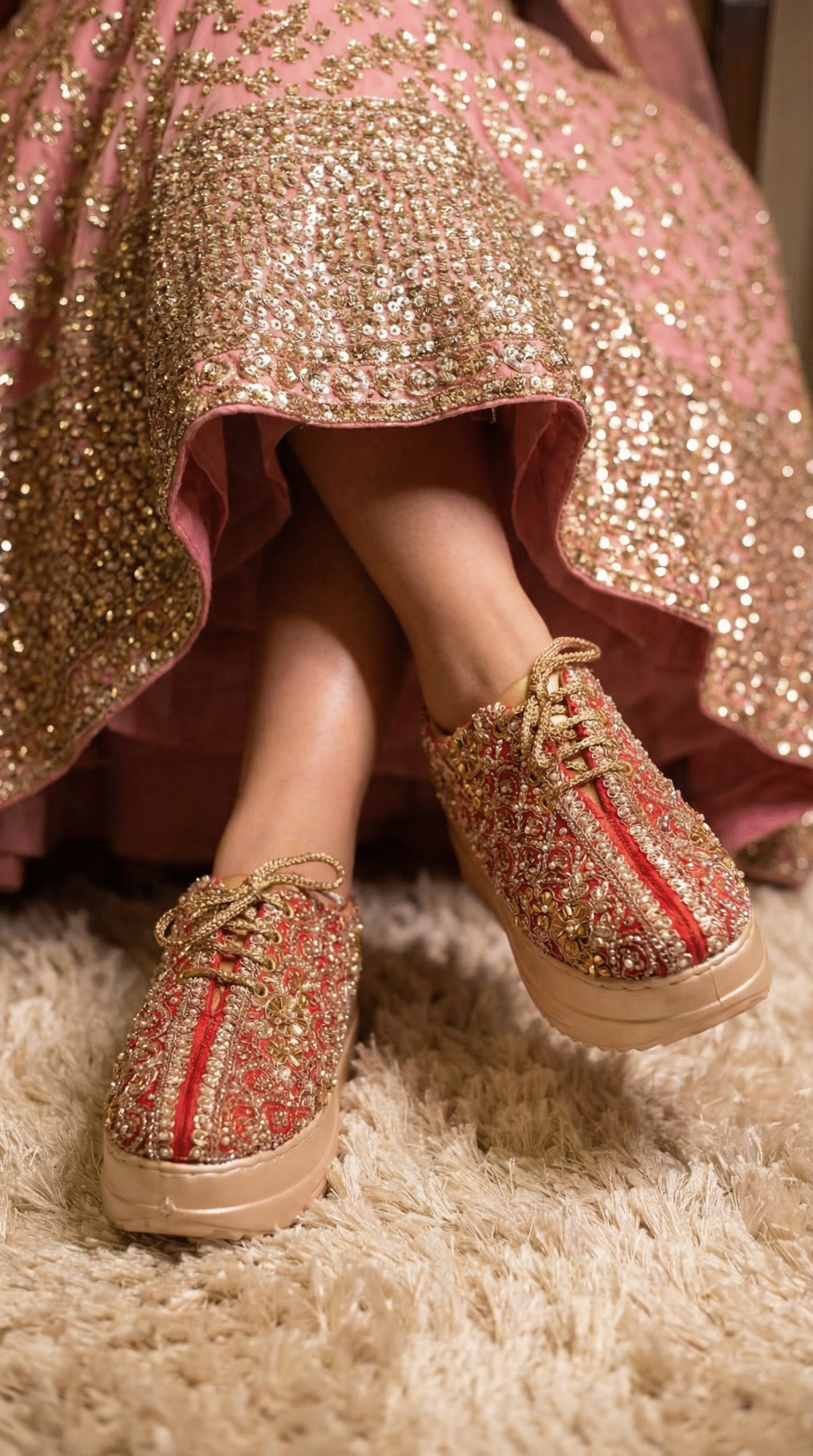 Firefly_Gemini Flash_Create an image in which the bride is wearing pink lehenga with full sequnce work on 403478